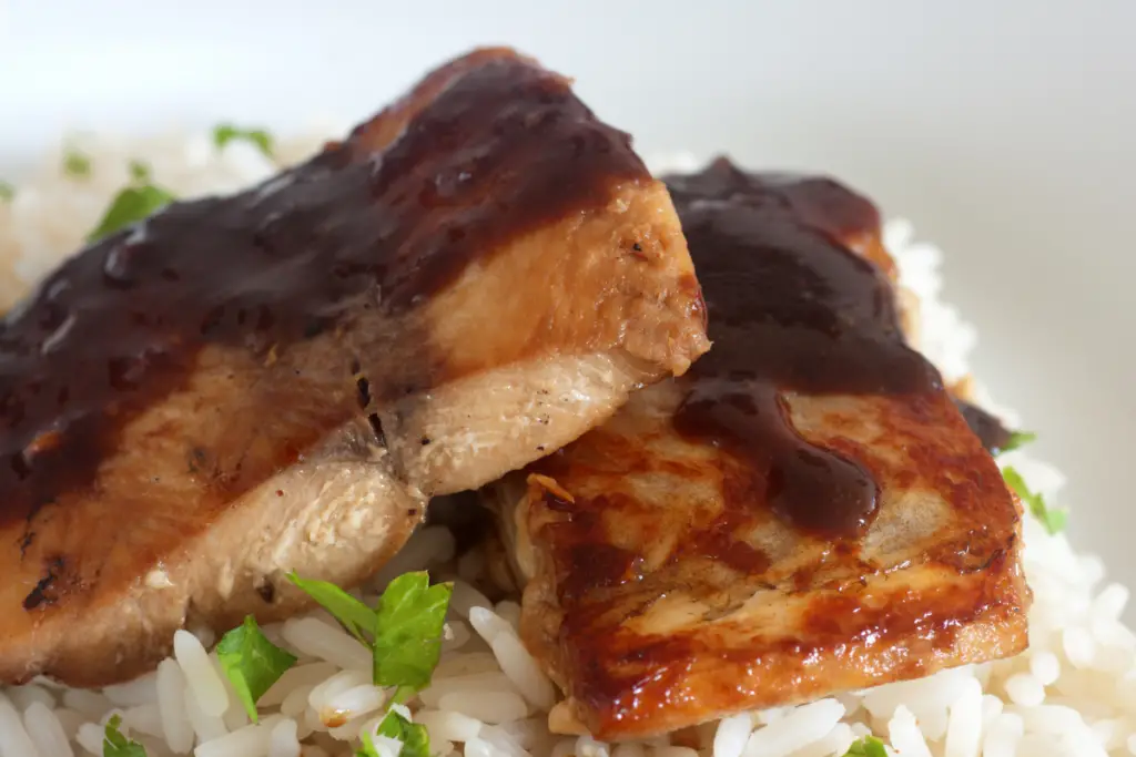 cooked Mahi Mahi fillet on bed of rice