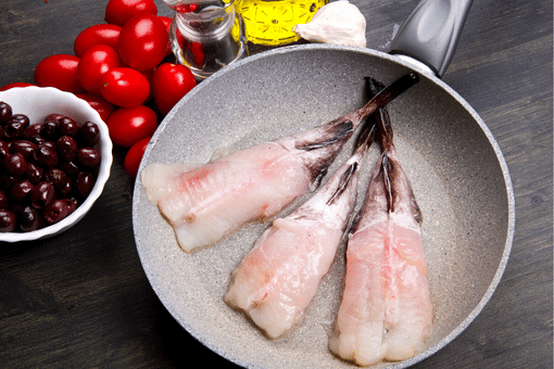 monkfish fillets in a frypan
