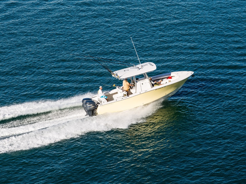 a small fishing boat underway offshore
